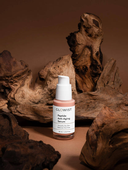 Peptide Renewal Serum with Hyaluronic Acid by GLOWIST in a sleek bottle, showcasing its hydrating formula and design.